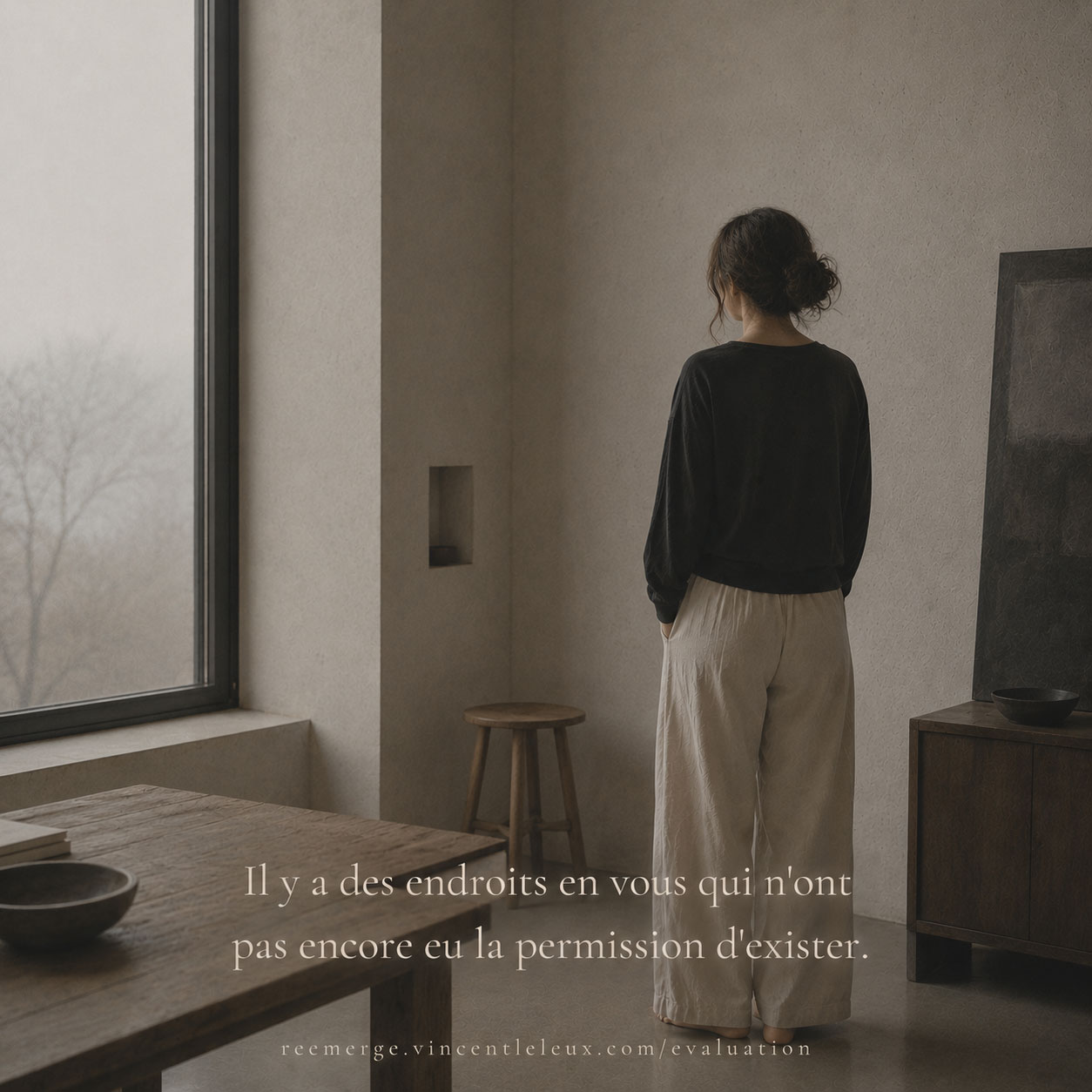Woman seen from behind standing at a doorway, Re-Emerge