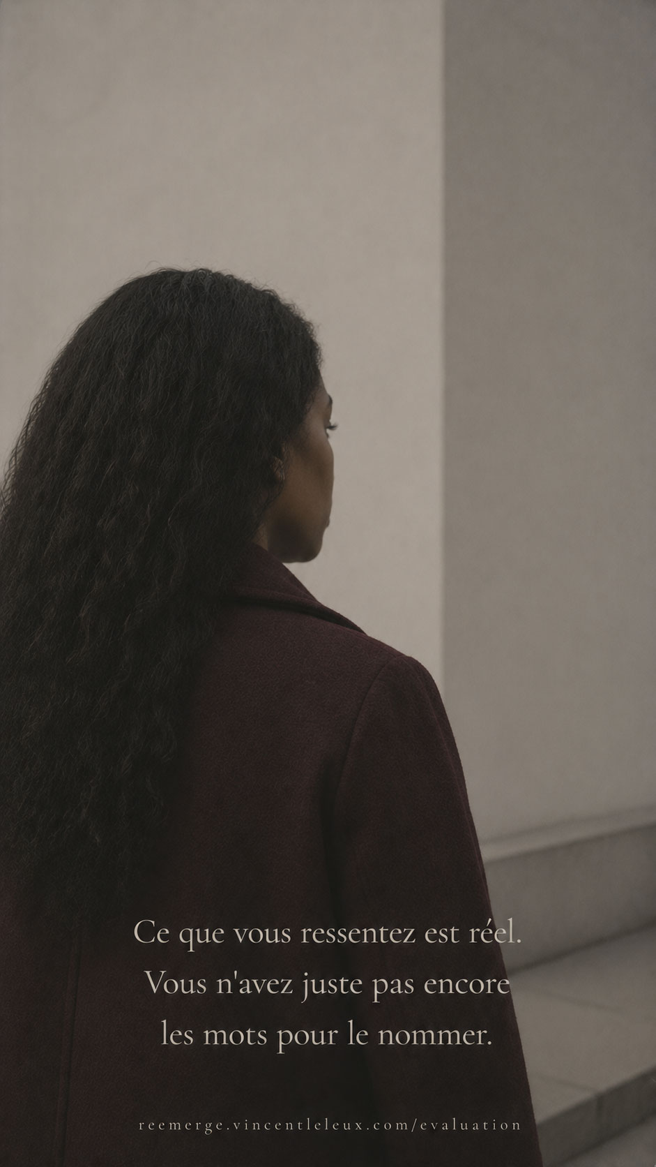 Black woman with long hair close-up seen from behind, Re-Emerge